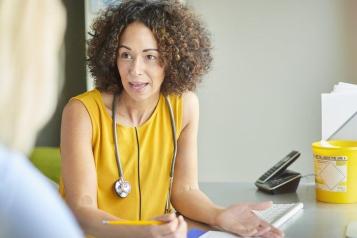 Female doctor in yellow dress