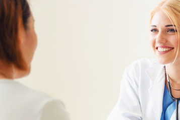 Female GP with patient