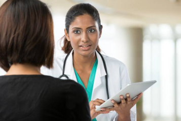 Female doctor in white coat