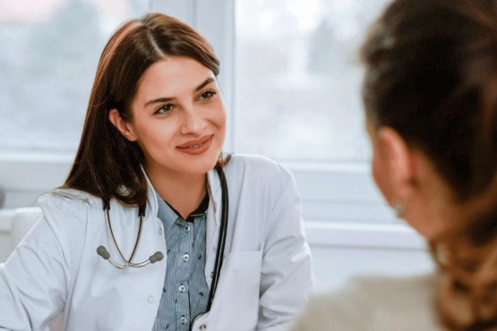 Female doctor with patient