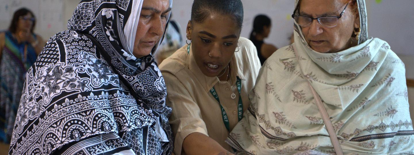 2 older women giving feedback