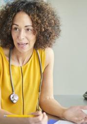 Female doctor in yellow dress