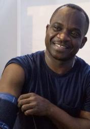 Black male patient having his blood pressure taken